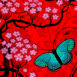 Papillon sur fond de cerisier en fleur